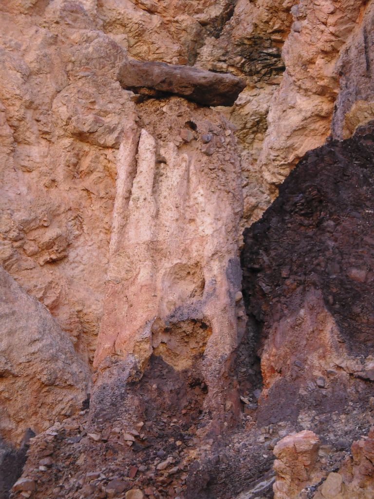 This the Kaleidoscope Spire, one of the stand-out features of the canyon.  Notice that a purple rock rests on the top of it: