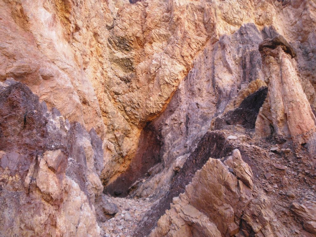 Brilliant and beautifully colored wall at this spot in the canyon.  The Kaleidoscope Spire can be seen here in the upper right corner: