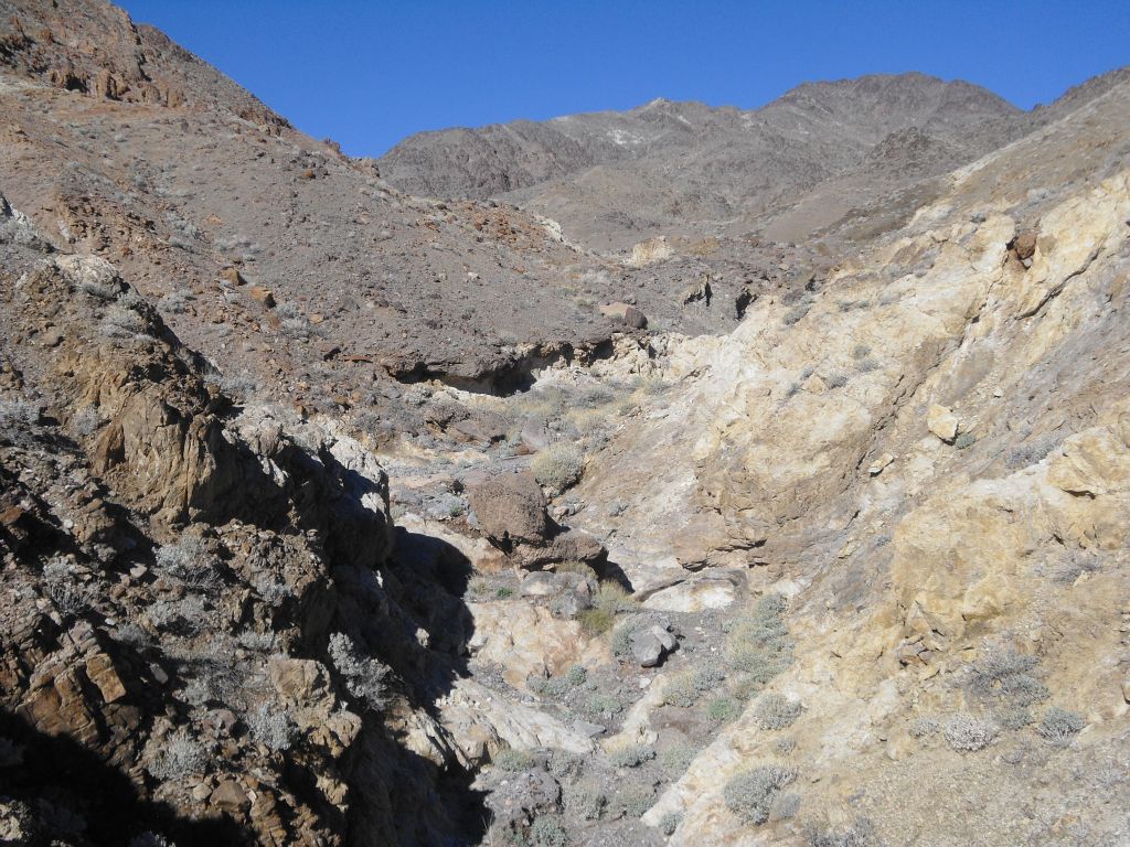 I briefly climbed the dry fall and surrounding hillside to get this picture looking further up canyon: