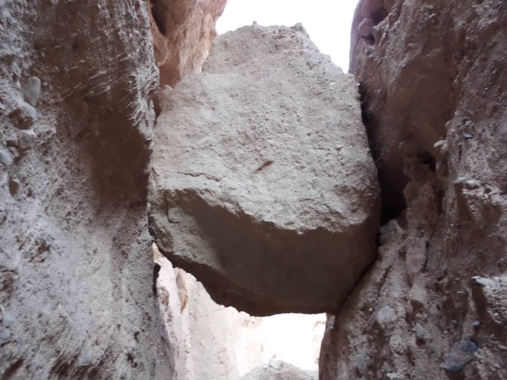 Two more views of the massive boulder trapped above our heads in the narrows: