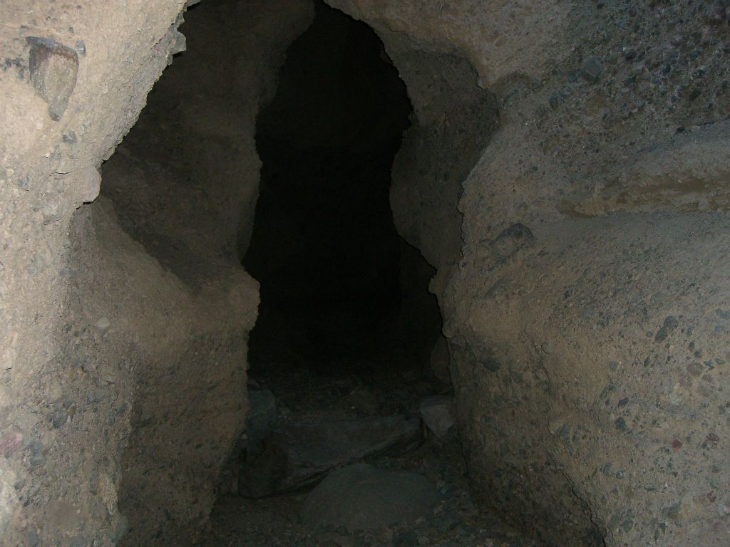 It was near the end of this slot that we entered one of the darkest canyon passages we had ever encountered in Death Valley: