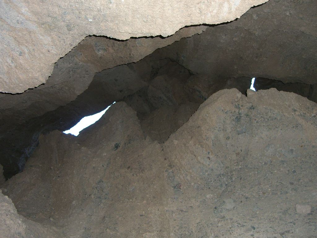 Looking up in this passageway we could see light and the sky above us, just barely: