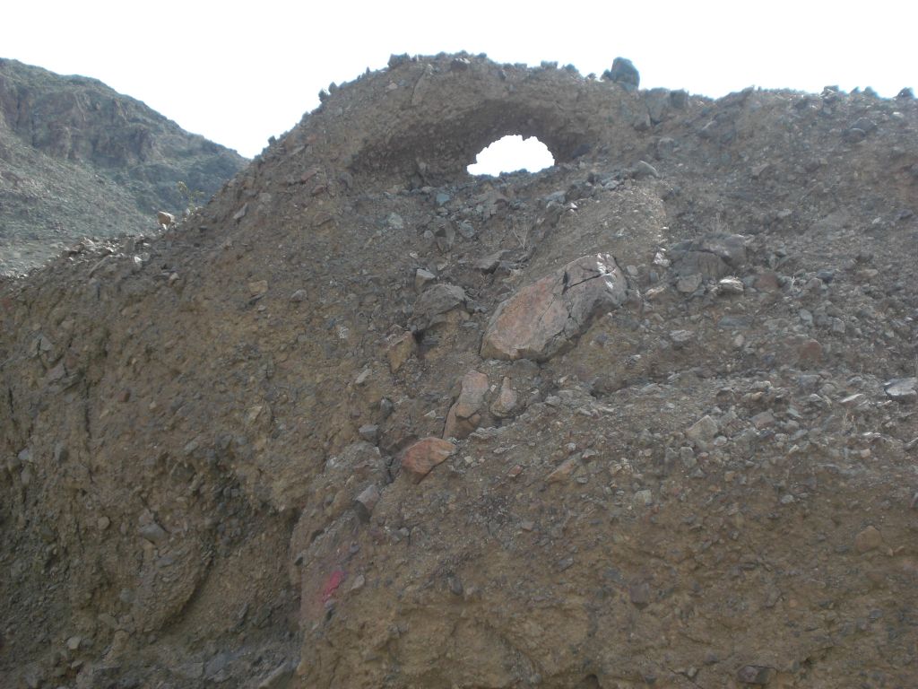 We ended up finding this small arch or window up on the hillside: