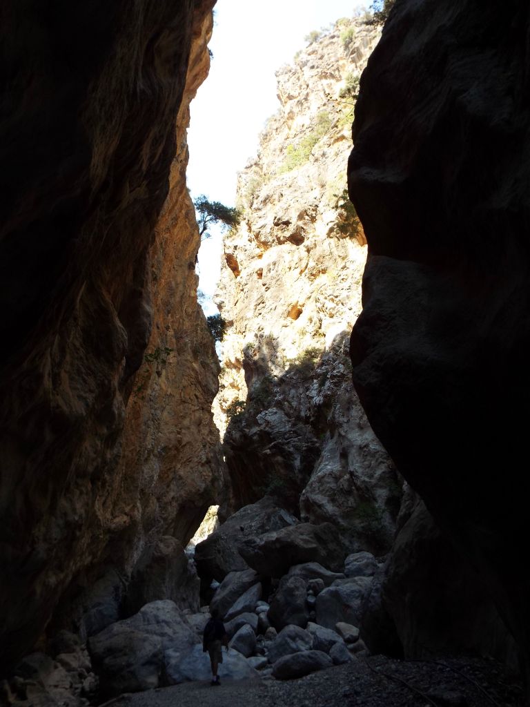 In the shadows of the narrows on another hot day in Crete, Greece: