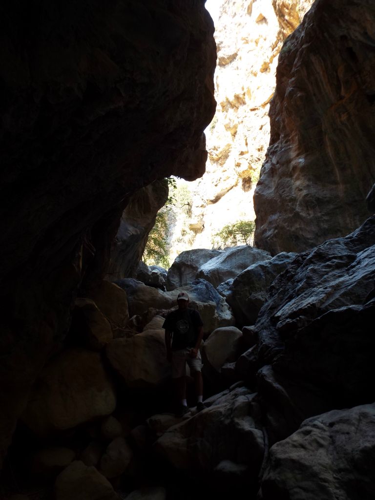 Steve pictured in the darkness of the narrows while climbing: