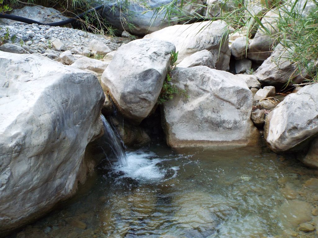 Two small waterfalls with a good amount of flowing water: