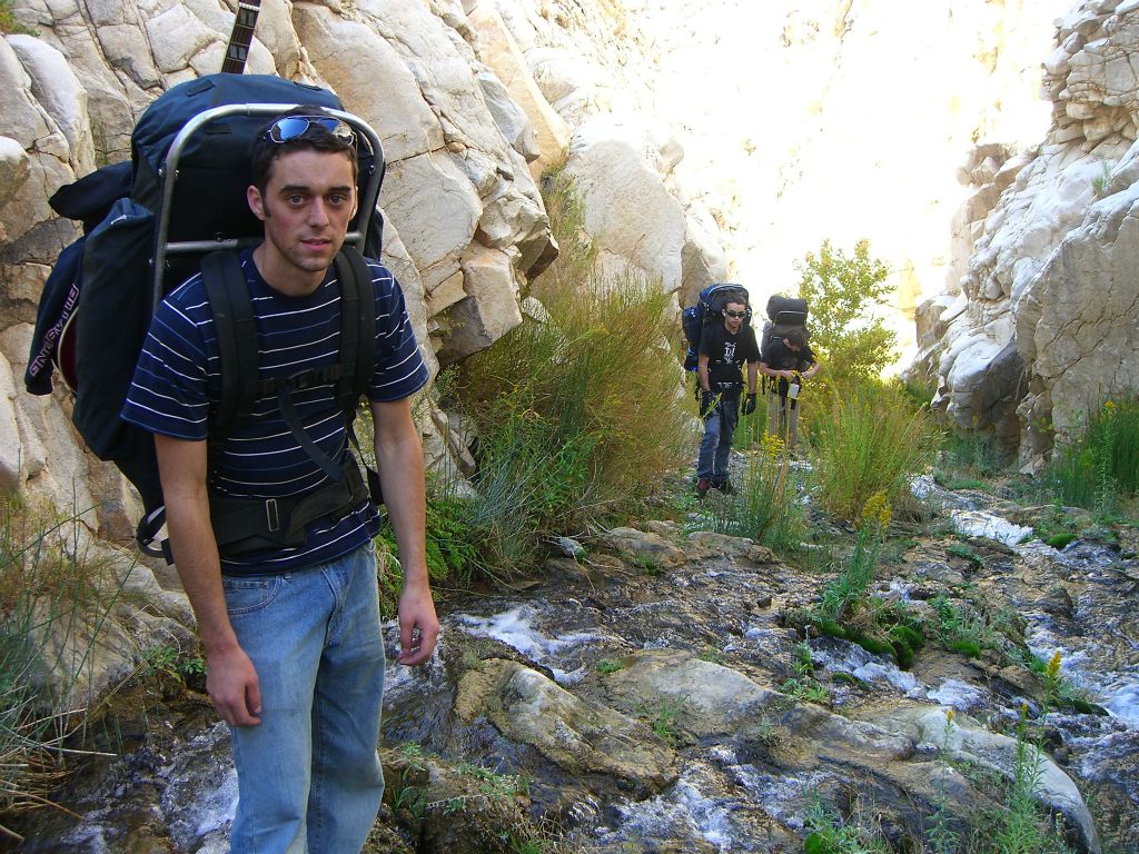 This is Ryan (carrying his acoustic guitar on his backpack), Loren, and Brandon passing through the upper falls of Surprise: