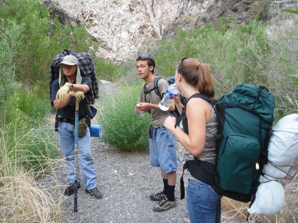 Gary, Andrew, and Tiffany taking a quick breather on the trail: