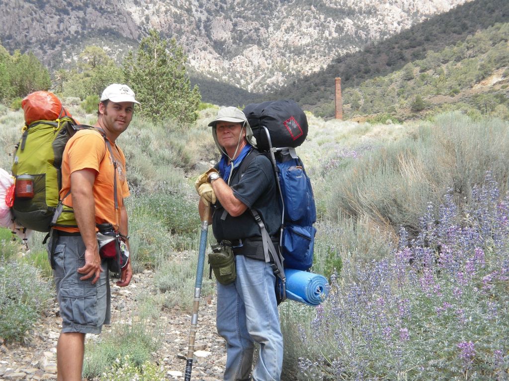 Steve and Gary nearly to the city center.  Flowers were in full bloom during The Long Mile and in Panamint City at the end of May: