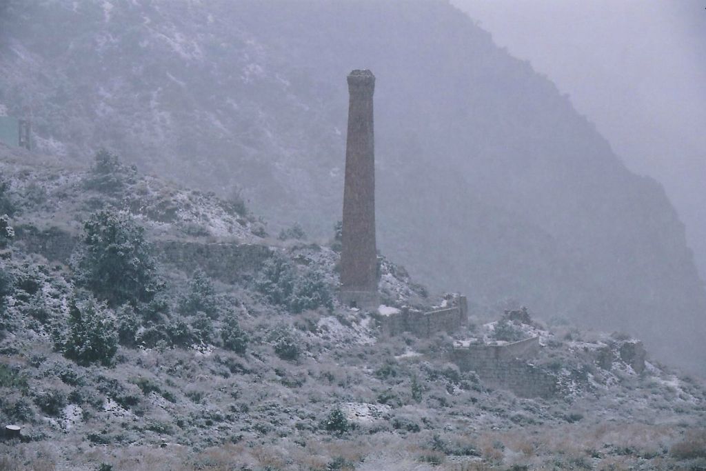 Looking at the smelter stack in the snow storm.  This is definitely a rare picture and I'm glad to have experienced this: