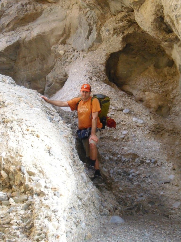 Steve climbing the dry fall in the grotto area in order to move on: