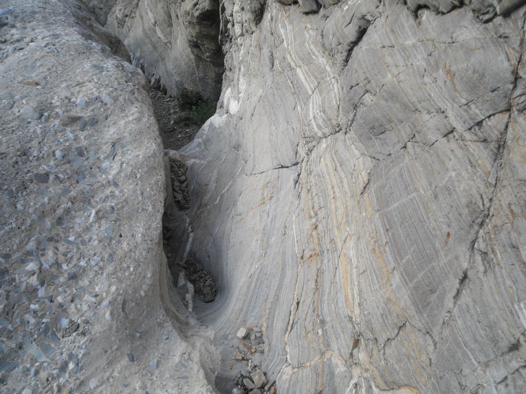 Climbing a short dry fall just above Lower spring and looking back: