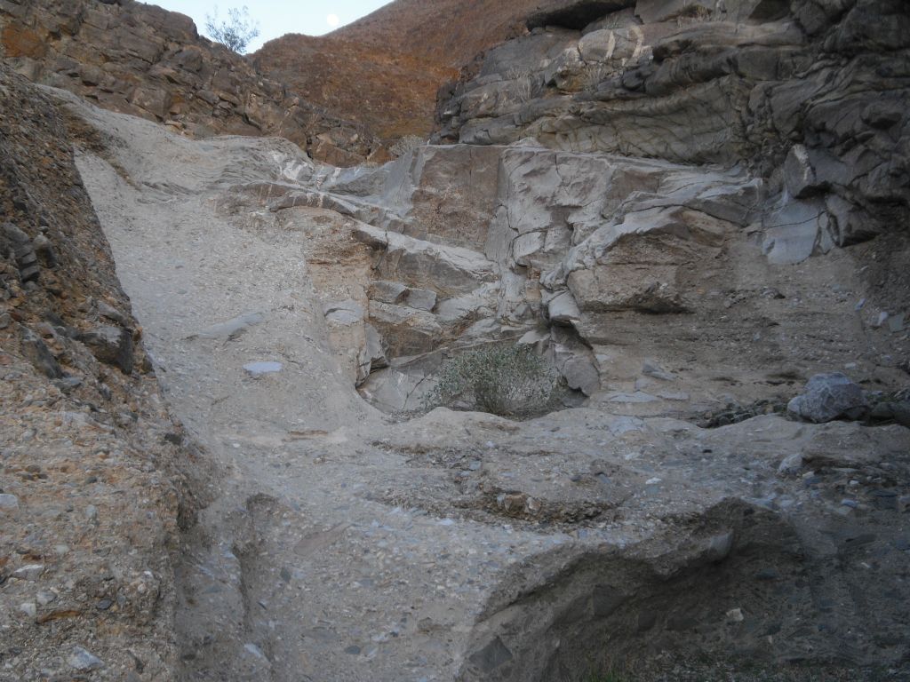 A wall of conglomerate rock that had to be climbed the next day: