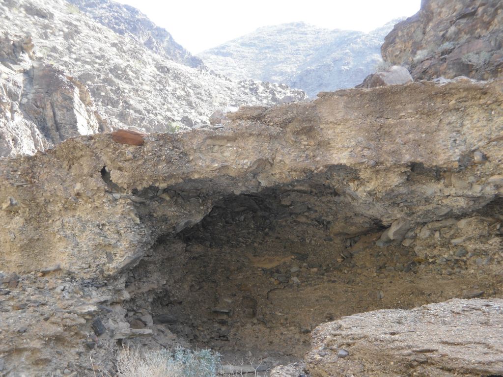 This cave and overhang were right in the middle of the canyon and we had to go around it: