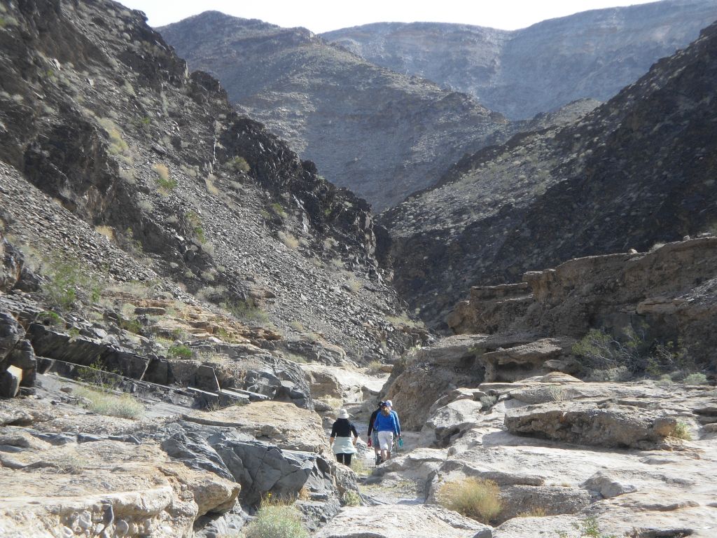 Our group hiking in the middle of the trenches, which are small natural channels through the conglomerate rock: