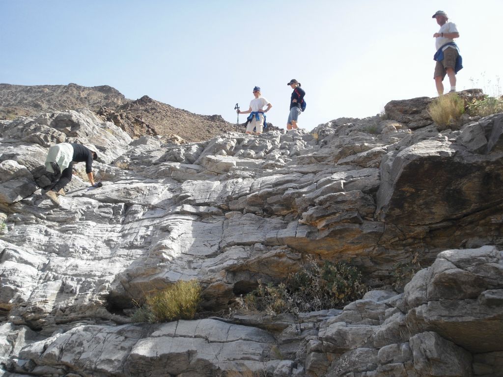 A fellow hiker is on the left climbing the first dry fall of her life.  She did a great job: