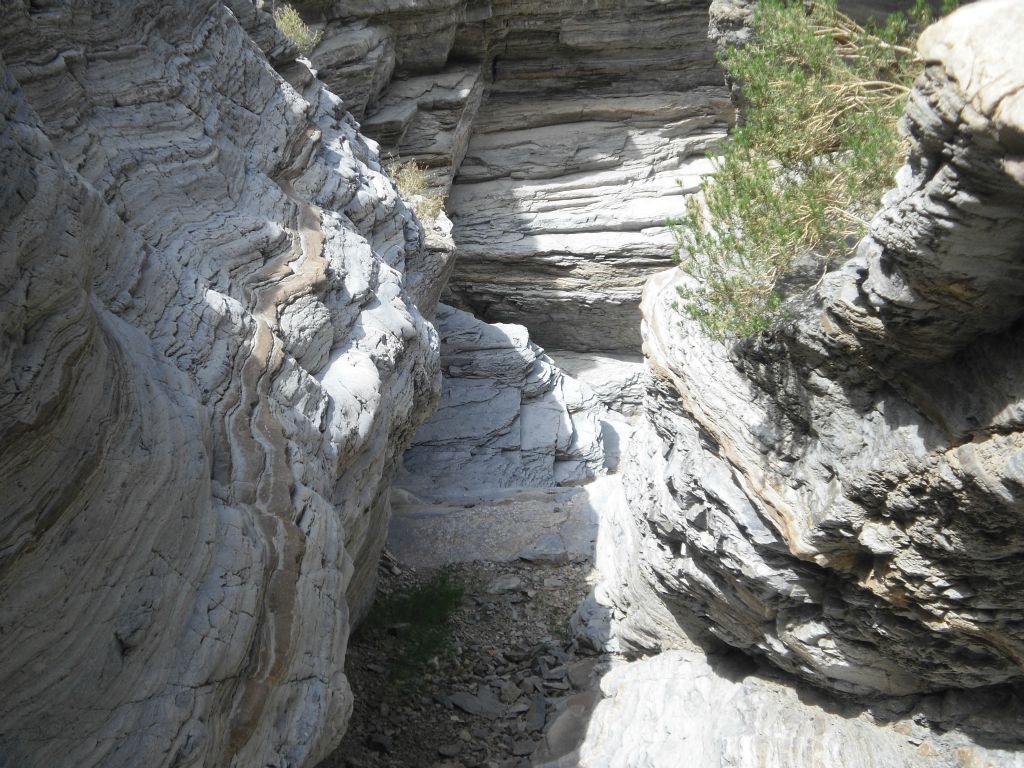 Here the canyon has constricted down and there is only a narrow slot to walk through: