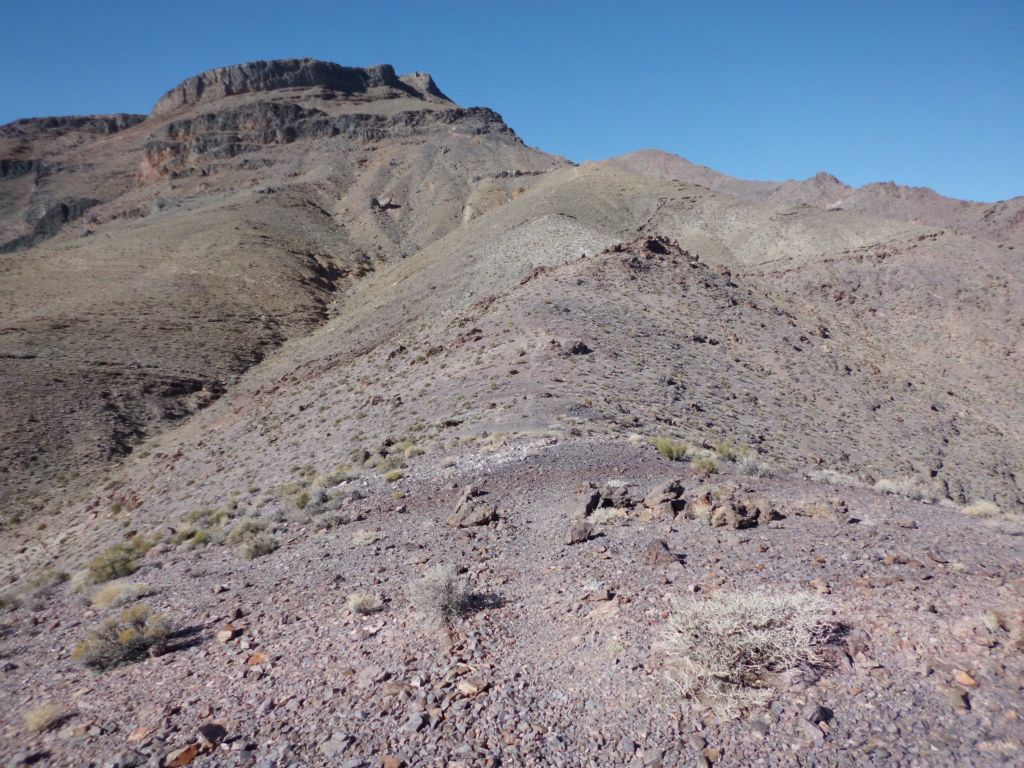 Continuing along the ridgeline in the next two pictures.  A steep and steady climb, without too many drop downs in between bumps: