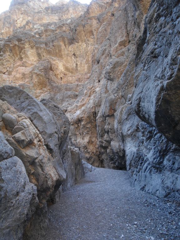 High towering cliffs are once again visible in the distance: