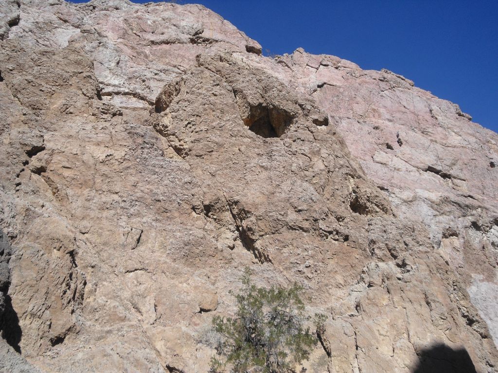 An interesting small cave appears high on the canyon wall: