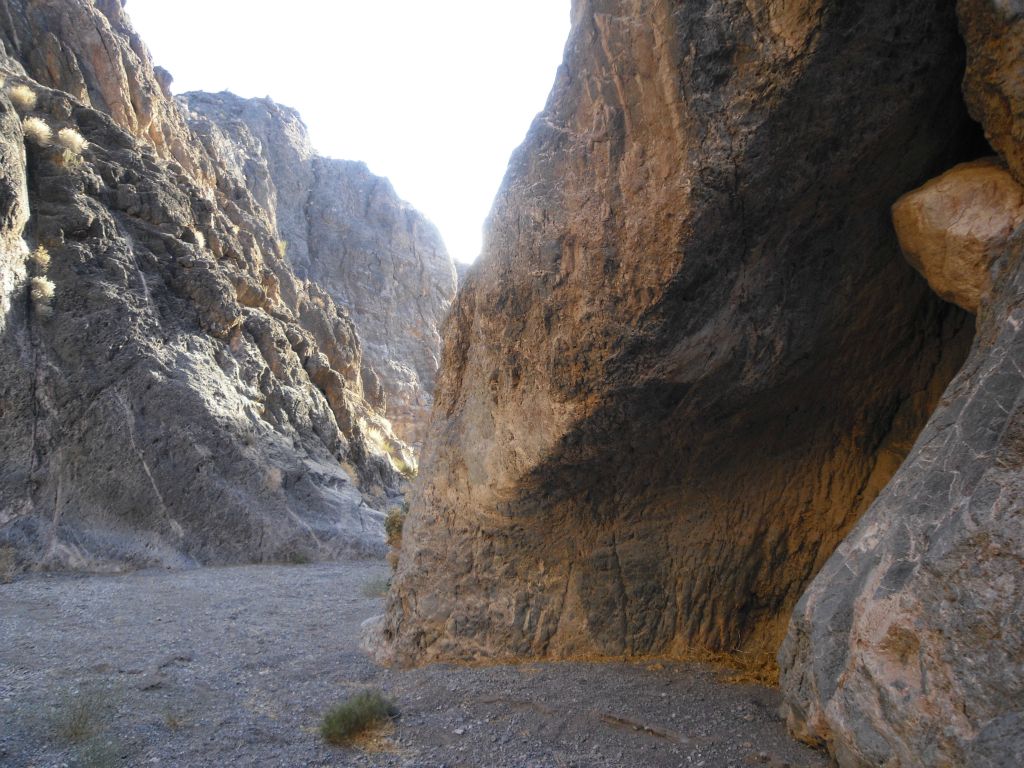 Notice the small wedged boulder to the right in the canyon wall: