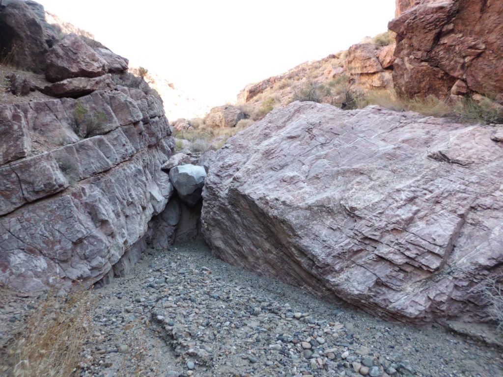 We would be hitting some narrows with light pink rock.  Notice the small dry fall topped by a chockstone: