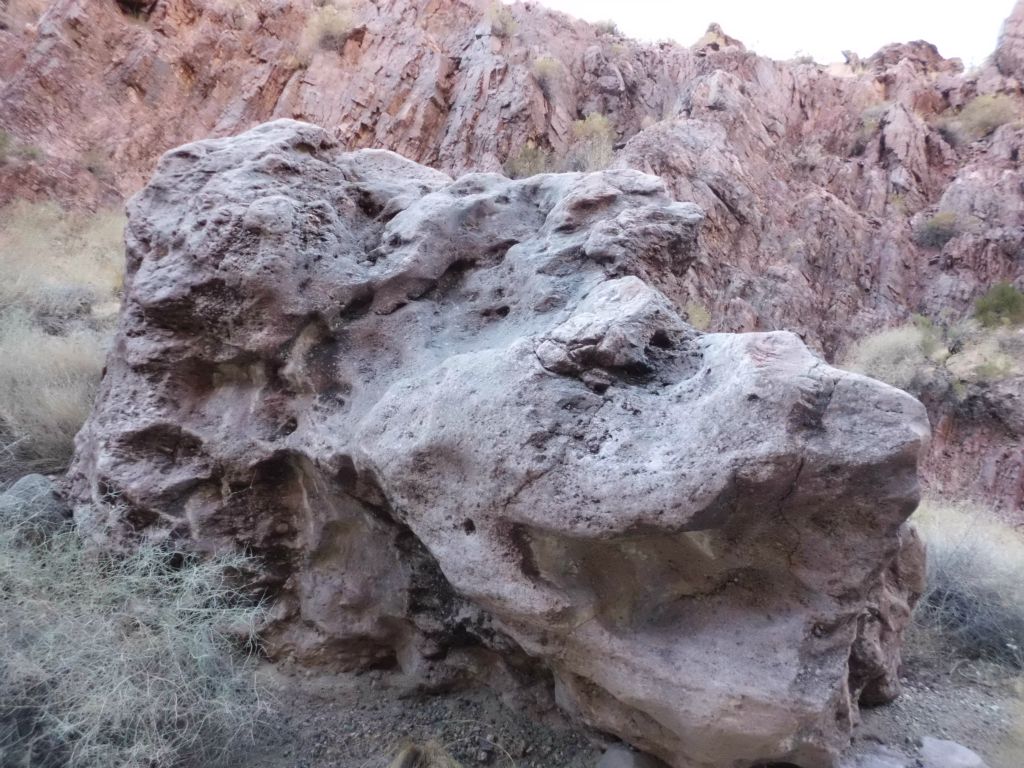 Beautiful rock sitting in the wash with an interesting shape and design to it: