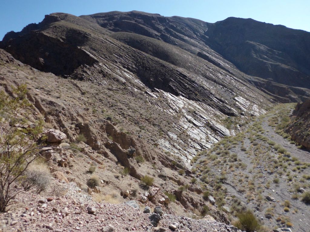 On the way back, we made our bypass route a little bit easier by climbing up the polished stone slabs you see: