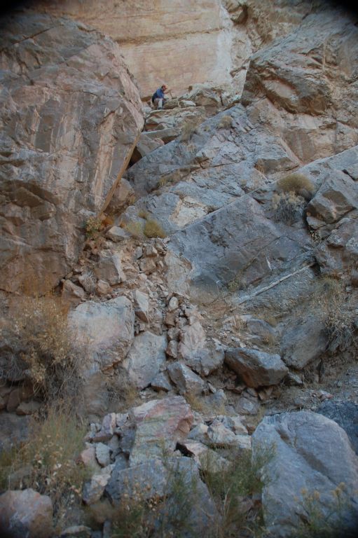 Tobin took this picture of Steve working his way back down the right option of the 3rd dry fall.  As you can see, there are a series of ledges which zigzag down with very crumbly and loose rock.  It would be easy to take a tumble here: