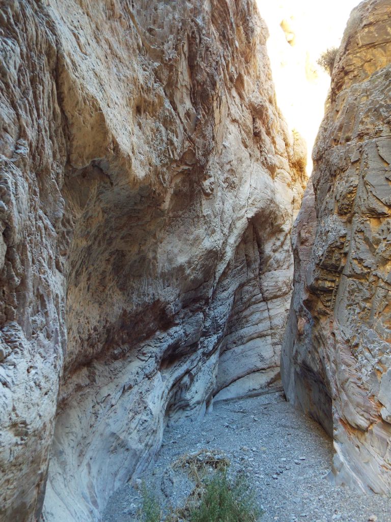 In the next three pictures, notice the striking curves on the canyon wall and the light just beyond: