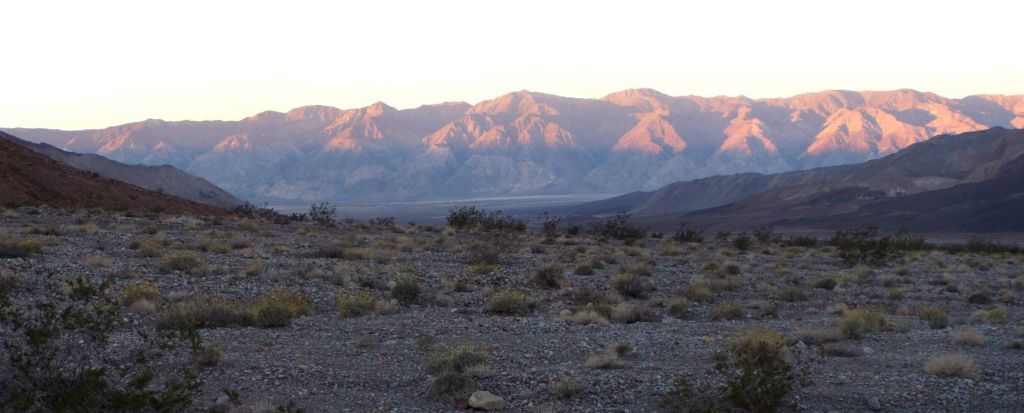 This panoramic shows the sun rising on the Inyo Mountains over Saline Valley: