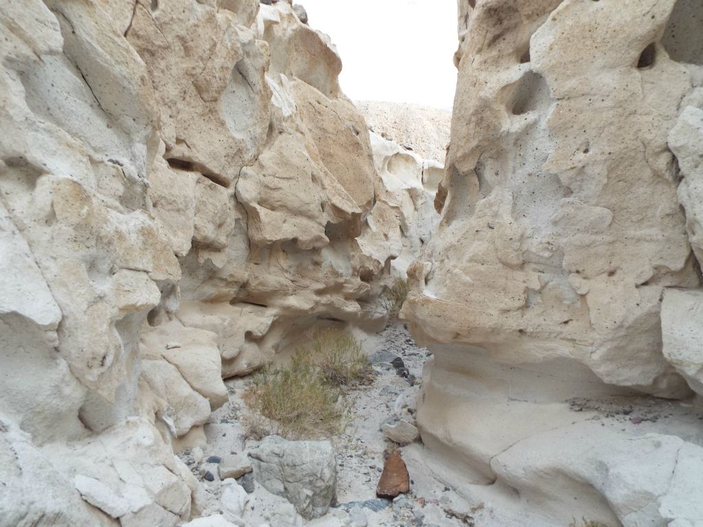 Looking carefully, it is evident how pieces of the canyon walls can break off and become boulders in the wash at any time: