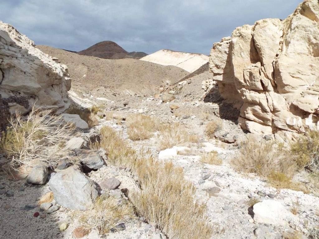 Back in the main canyon, a massive white-colored hillside can be seen in the distance: