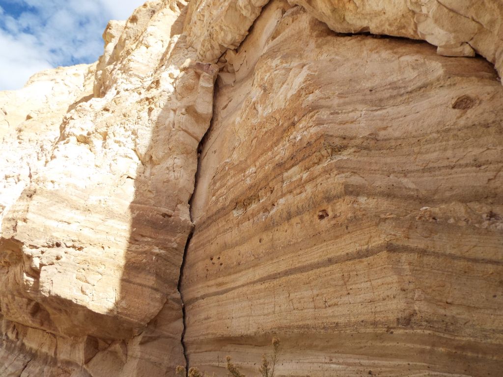 Notice the distinct lines and patterns which have been revealed at this area where part of the original wall has fallen off: