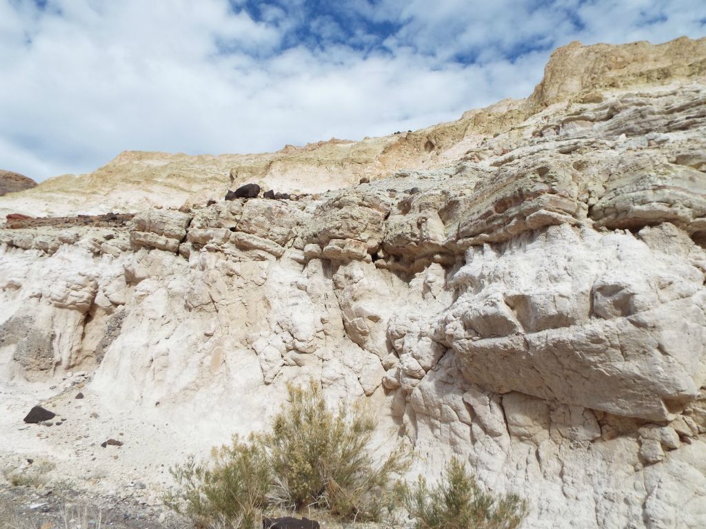 The top of the white hillsides seen high above the canyon wash were over 600 feet above us: