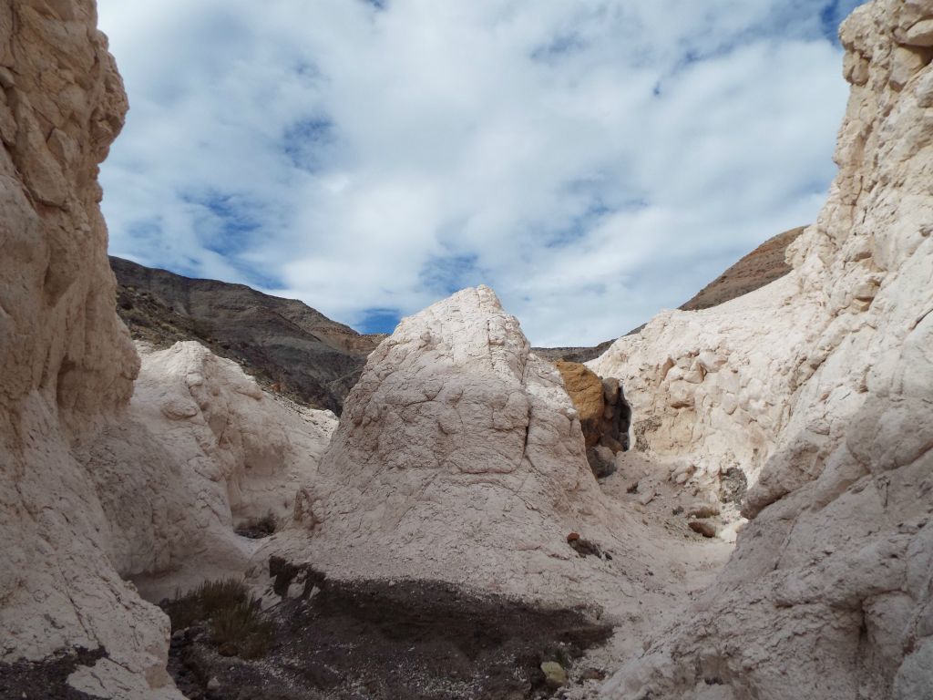 Reaching a minor junction in the side canyon with what looks like a tough obstacle in the right fork: