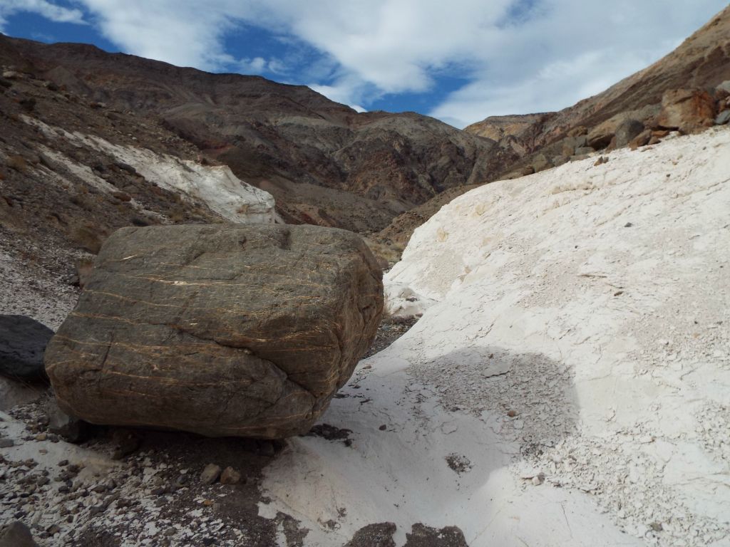 Standing at the spot in the side canyon where the color transitions from light to dark: