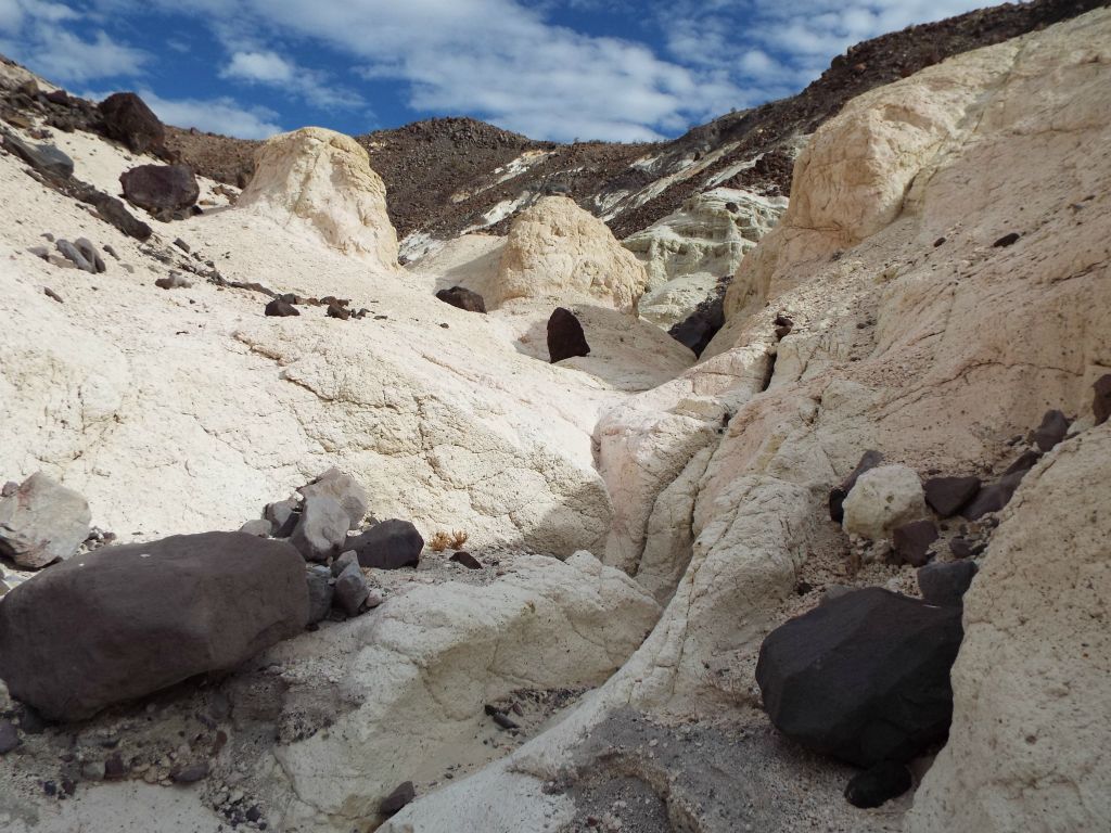 The white terrain was interrupted by this area where darker boulders are attempting to roll in and dilute the color: