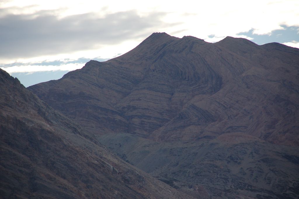 Zooming in on a distant peak we had driven past earlier.  This unnamed peak is about 4.1 air miles north of Warm BM: