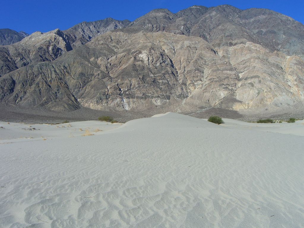 As we continued heading east across the sand dunes, we would get better views of the Inyos: