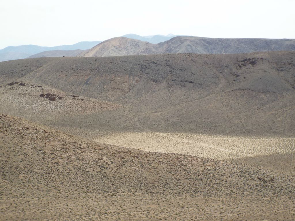 Upon reaching the 2nd ridge, we could see our vehicle parked back on the 1st ridge.  We were currently at about the same elevation as where we started (5,425 feet).  But in crossing the valley, we had gained and lost hundreds of feet: