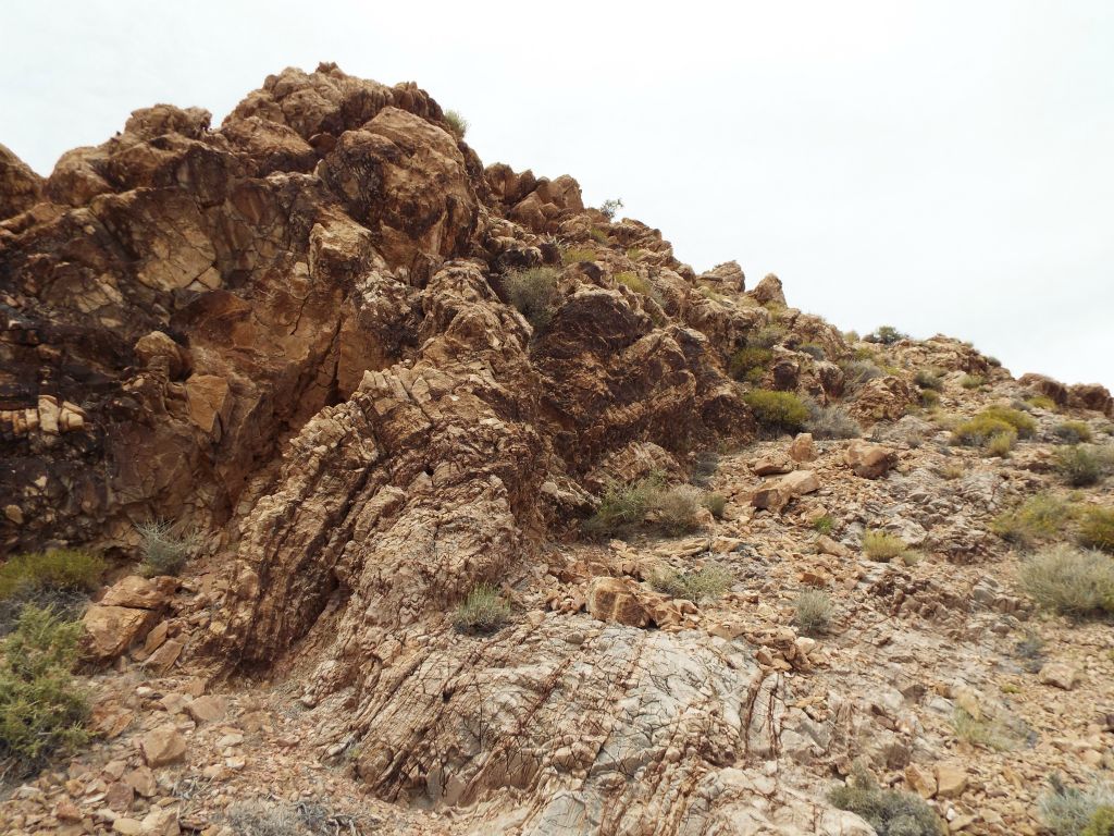 When we reached these rock outcroppings, we stayed to the right and worked our way around them.  The terrain was easier and the wind wasn't as fierce: