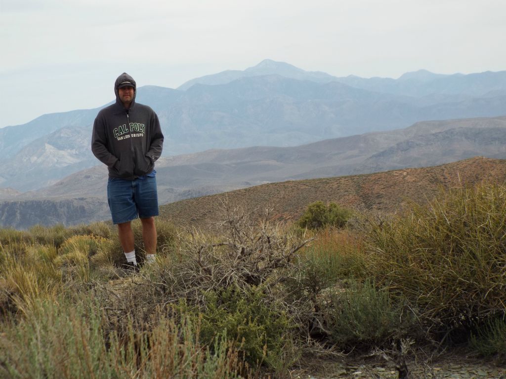 In these two pictures of me taken on the summit of Tucki Mountain, you can see how I was trying hard to stay warm despite this being mid-May: