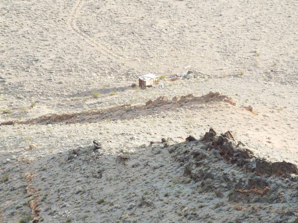 Zooming in on the cabin while hiking down from the 2nd ridge: