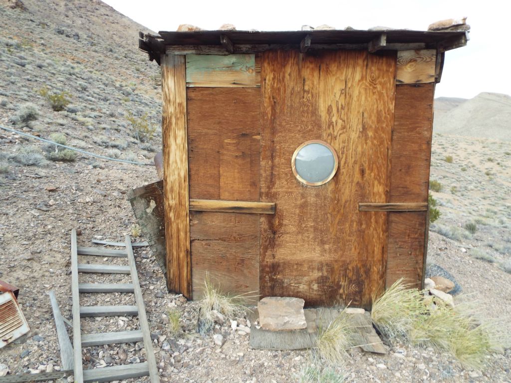 The northern side of Old Martin Cabin has a porthole to allow light inside: