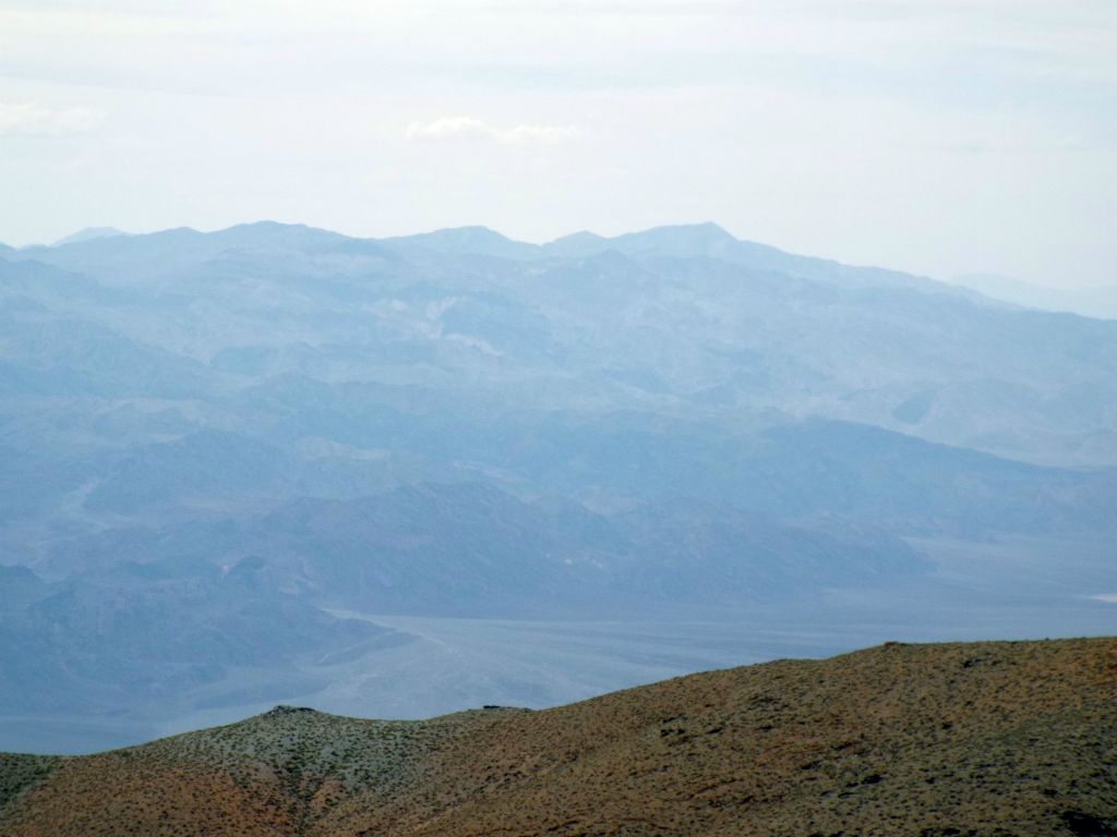 Dry Mountain (left side) was faintly visible popping up above the Cottonwoods and so was Tin Mountain (right peak):