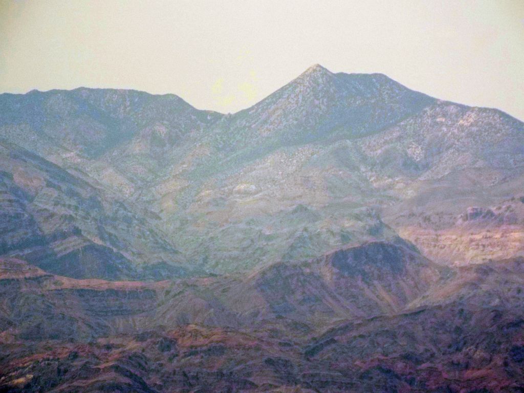 Zooming in on the always distinct Wahguyhe Peak.  A few pictures are overexposed due to the haze: