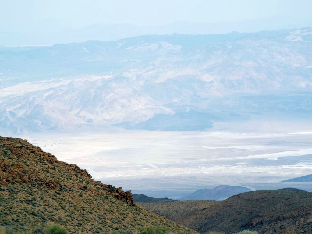 View to the southeast with Artist's Drive cutting through the middle portion of the picture (the darker rock):