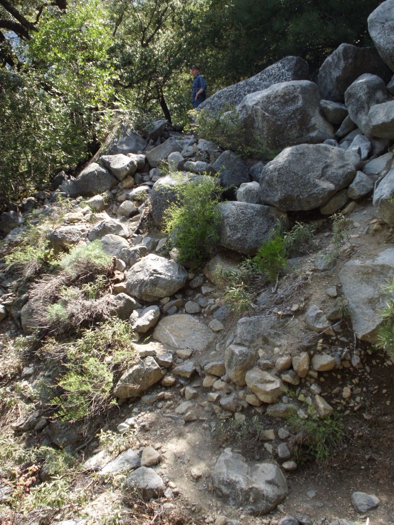 Charlie can be seen at the top of this picture.  The 1st washout is simple to overcome -- drop down and then climb back up the other side: