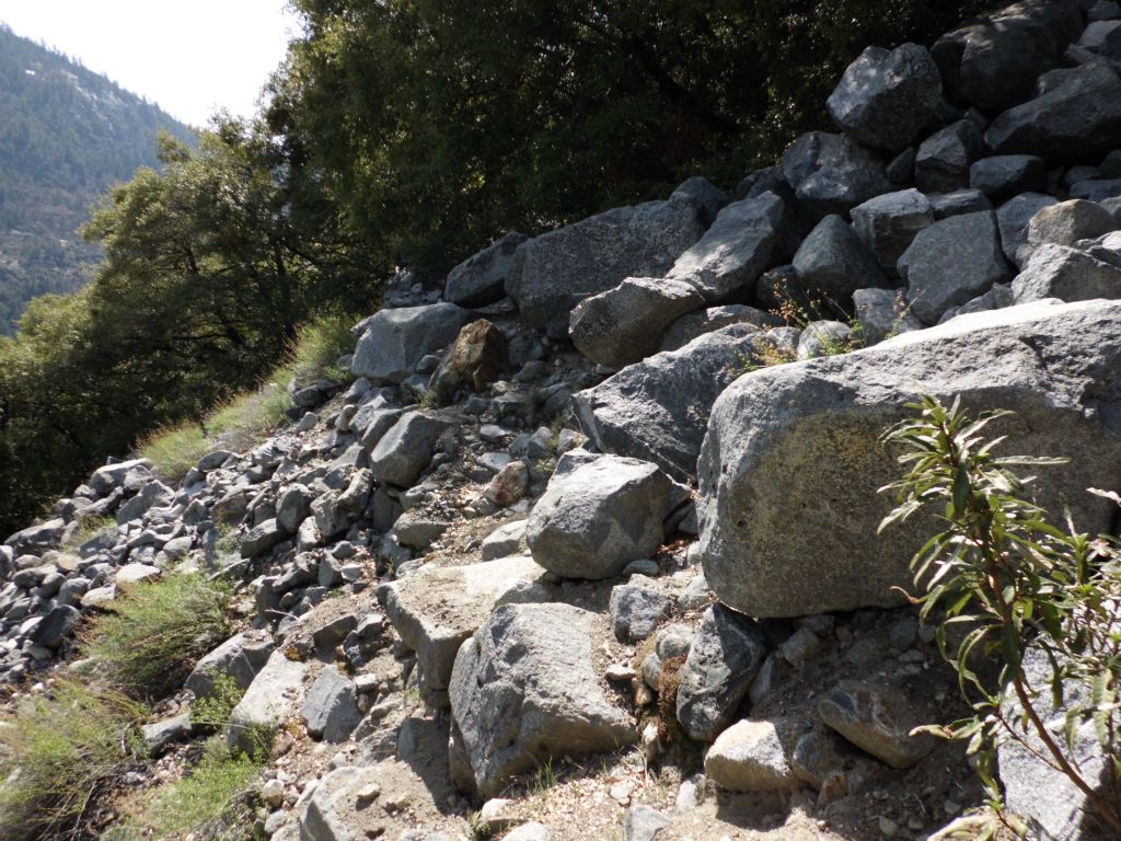 Dealing with another washout in the next two pictures.  About halfway  through the hike, these washouts start appearing very regularly: